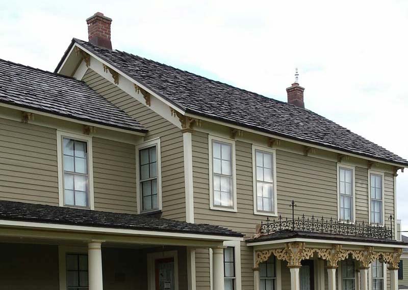 Professional painters in action at a home in Wayne County, MI