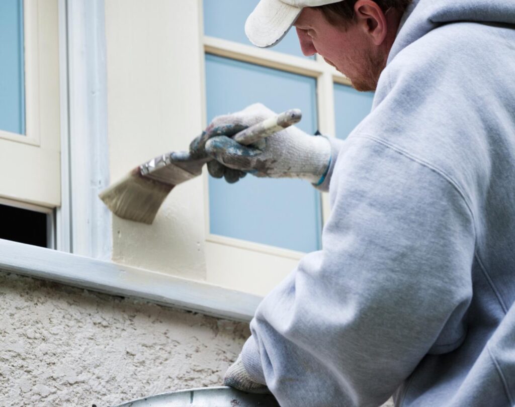 Exterior painting near me in Howell, MI showing freshly painted siding and trim