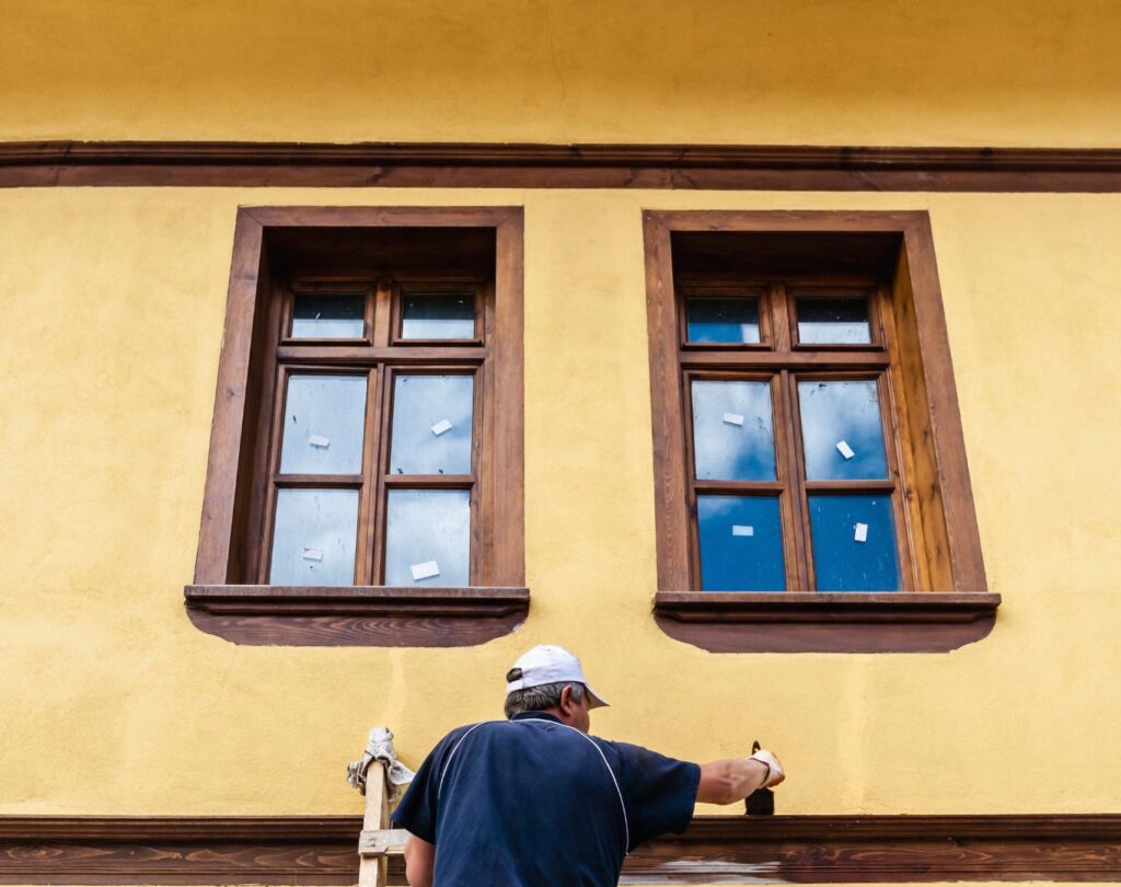 House painting in Ann Arbor, MI refreshing a residential property with coordinated colors and crisp exterior details